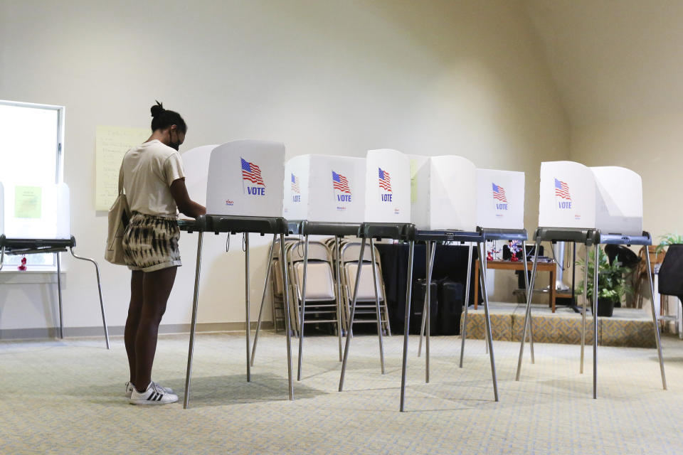 Briana Thornton votes in the state's primary election, Tuesday, June 8, 2021, at Unity Church of Tidewater in Virginia Beach, Va. (Trent Sprague/The Virginian-Pilot via AP)