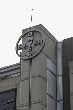 The corporate logo of Bayer is seen at the company's headquarters in Caracas March 1, 2016. Picture taken March 1, 2016. REUTERS/Marco Bello