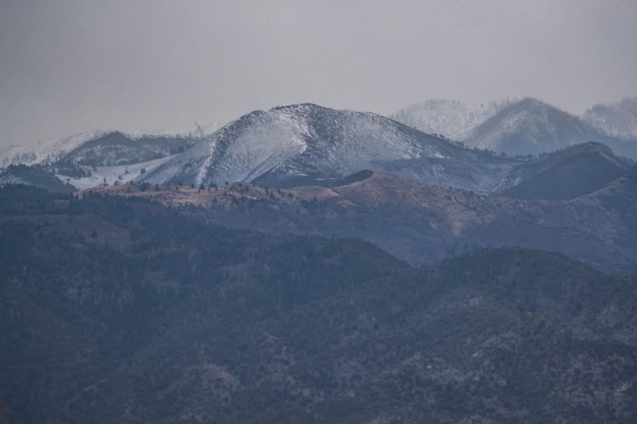 Clouds and fog blanket the mountains near Three Rivers Campground at Lincoln National Forest on Wednesday, April 28, 2021.