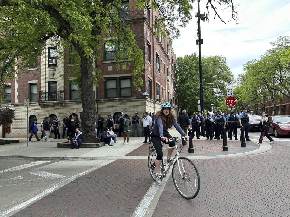 Antiwar protesters rallied at DePaul University in Chicago, Thursday evening, May 16, 2024, after an encampment at the campus quad had been taken down by university police early in the morning. (AP Photo/Melissa Perez Winder)