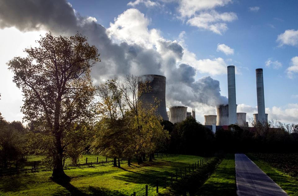 Steam rises from a coal-fired power plant in Niederaussem, Germany, on Nov. 2, 2022. CO2 emissions from coal use are expected to grow 1.1% in 2023, reaching a record high and exceeding the temporary peak in 2014.