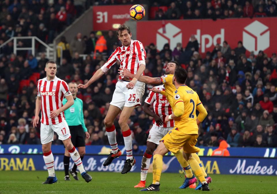 <p>Stoke City’s Peter Crouch heads towards goal</p>