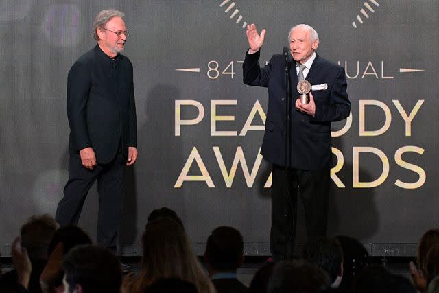 <p>Charley Gallay/Getty </p> Mel Brooks accepts his Career Achievement Award at the 2024 Peabody Awards, presented by Billy Crystal