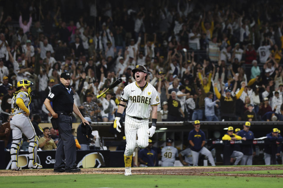 San Diego Padres' Jake Cronenworth tosses his bat after hitting a game-winning solo home run against the Milwaukee Brewers during the ninth inning of a baseball game Thursday, June 20, 2024, in San Diego. (AP Photo/Derrick Tuskan)