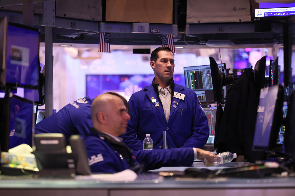 FTSE NEW YORK, NEW YORK - FEBRUARY 05: Traders work on the floor of the New York Stock Exchange during afternoon trading on February 05, 2024 in New York City. The stock market closed down with the Dow Jones leading the way, closing more than 250 points lower amid speculation that the federal reserve is unlikely to make rate cuts in March. (Photo by Michael M. Santiago/Getty Images)