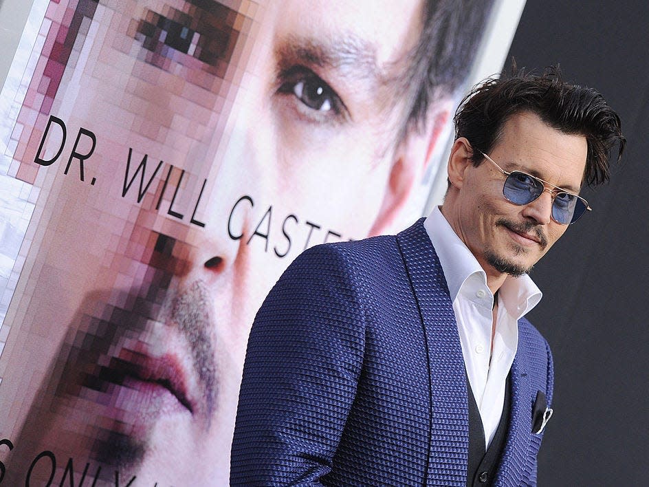 Actor Johnny Depp arrives at the Los Angeles premiere of 'Transcendence' at Regency Village Theatre on April 10, 2014 in Westwood, California.