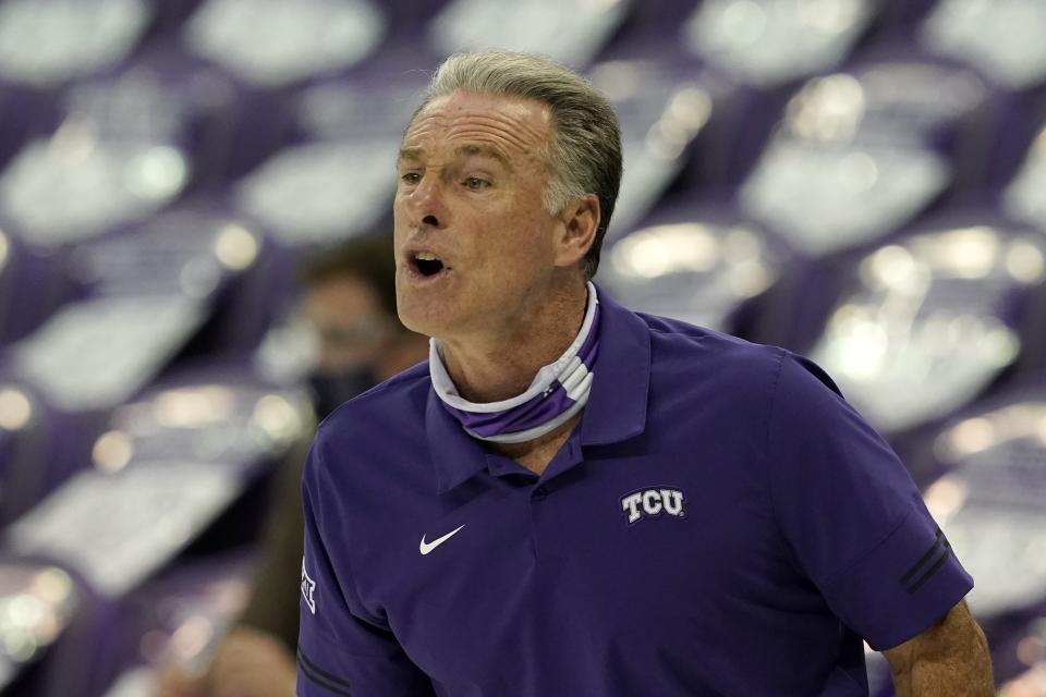 TCU head coach Jamie Dixon instructs his team in the second half of an NCAA college basketball game against North Dakota State in Fort Worth, Texas, Tuesday, Dec. 22, 2020. (AP Photo/Tony Gutierrez)