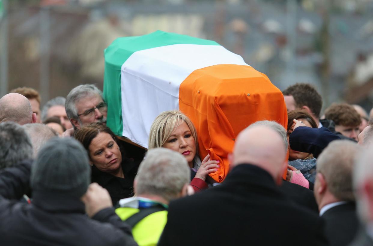 Sinn Fein's Gerry Adams and Michelle O'Neill carrying Martin McGuinness's coffin: PA