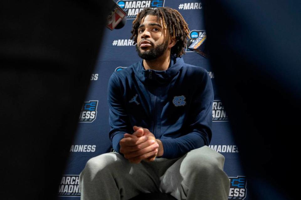 North Carolina’s R.J. Davis (4) is surround by reporters as he takes questions during the Tar Heels’ media availability on Friday, March 22, 2024 at Spectrum Center in Charlotte, N.C. Robert Willett/rwillett@newsobserver.com