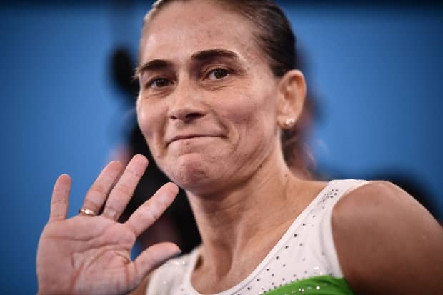 Uzbekistan's Oksana Chusovitina is retiring, at the age of 46, after competing in her record-extending eighth Olympic Games in Tokyo on Sunday.   (Loic Venance/Getty Images - image credit)