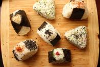 <p>If you love <a href="https://www.delish.com/cooking/recipe-ideas/g40785924/sushi-recipes/" rel="nofollow noopener" target="_blank" data-ylk="slk:sushi;elm:context_link;itc:0;sec:content-canvas" class="link ">sushi</a>, onigiri is a must-try: a humble rice ball accented by a variety of fillings, wrapped in roasted seaweed (nori), and perfect for snacking or a light meal. Onigiri is open to customization and experimentation too—try one of our filling options, or create your own.</p><p>Get the <strong><a href="https://www.delish.com/cooking/recipe-ideas/a34195640/onigiri-recipe/" rel="nofollow noopener" target="_blank" data-ylk="slk:Onigiri (Japanese Rice Balls) recipe;elm:context_link;itc:0;sec:content-canvas" class="link ">Onigiri (Japanese Rice Balls) recipe</a></strong>.</p>