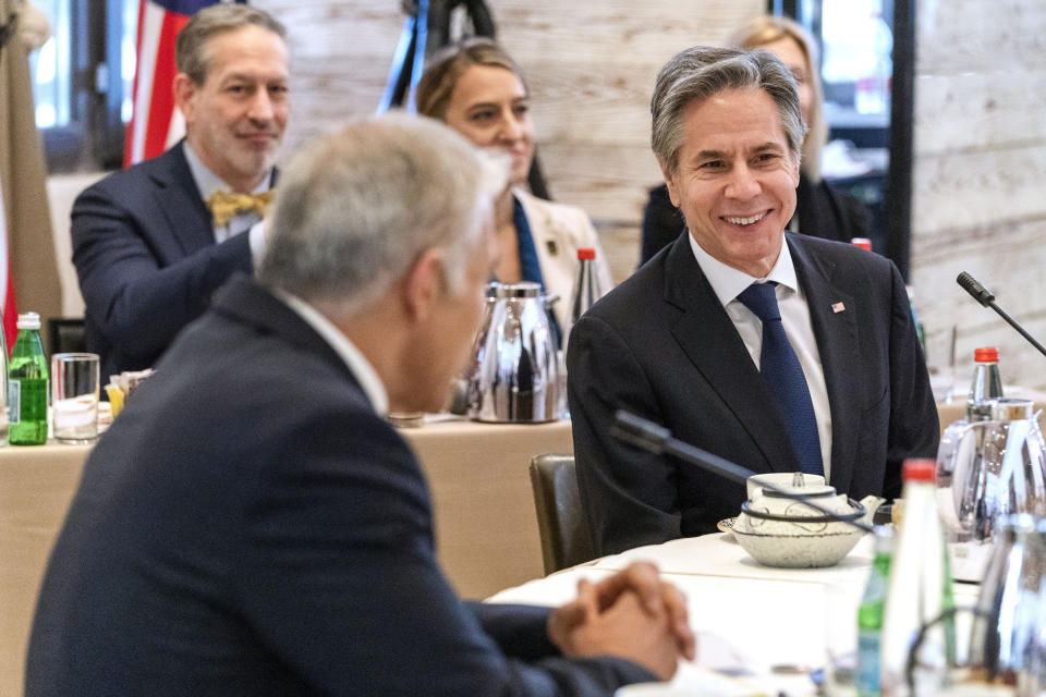 The opening roundtable begins at the Negev Summit, as Israel's Foreign Minister Yair Lapid, left, makes opening remarks next to U.S. Secretary of State Antony Blinken, Monday, March 28, 2022, in Sde Boker, Israel. (AP Photo/Jacquelyn Martin, Pool)