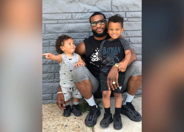 PHOTO: Massiah Browne, 7, poses with his younger brother and their dad, Marcus Browne. (Tiara Delvalle)