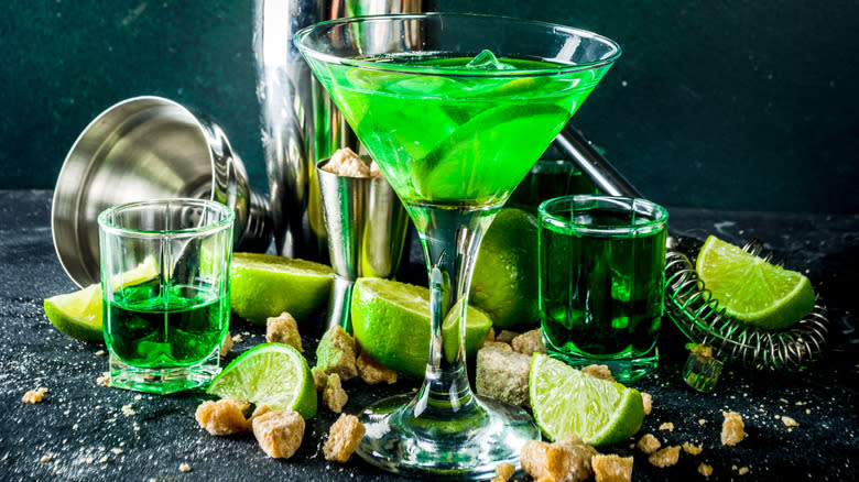 green cocktail in martini glass