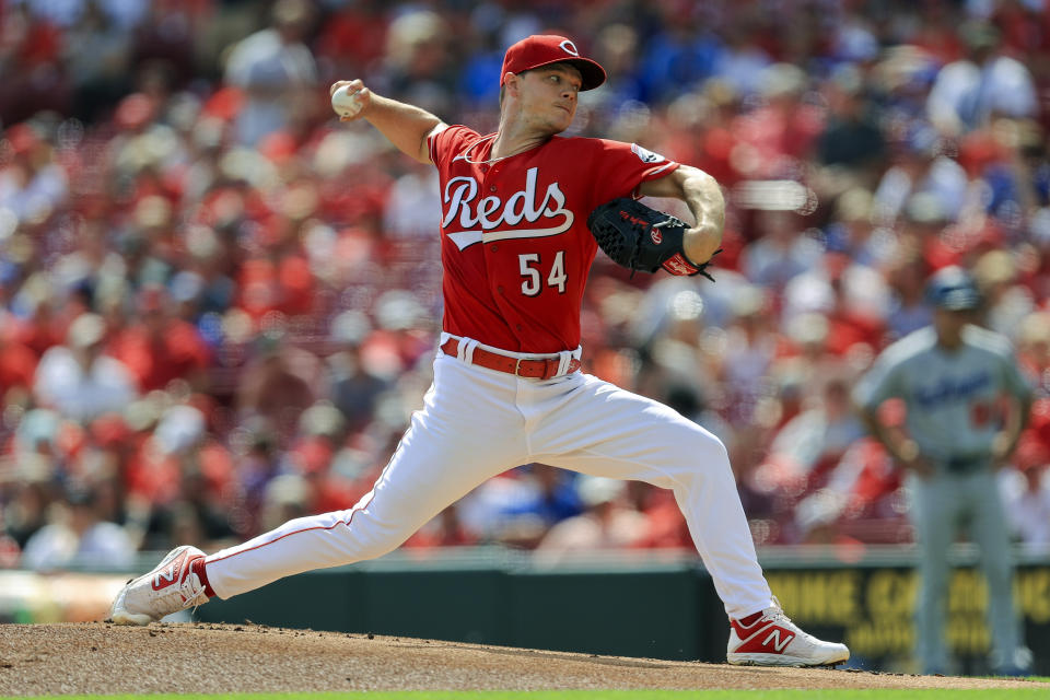 Cincinnati Reds' Sonny Gray throws during the first inning of a baseball game against the Los Angeles Dodgers in Cincinnati, Saturday, Sept. 18, 2021. (AP Photo/Aaron Doster)