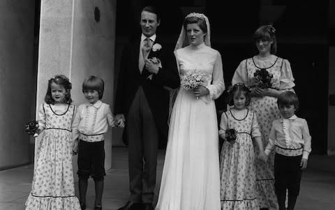 Diana (r) was bridesmaid for her sister's marriage to Robert Fellowes in 1978 - Credit: PA Archive