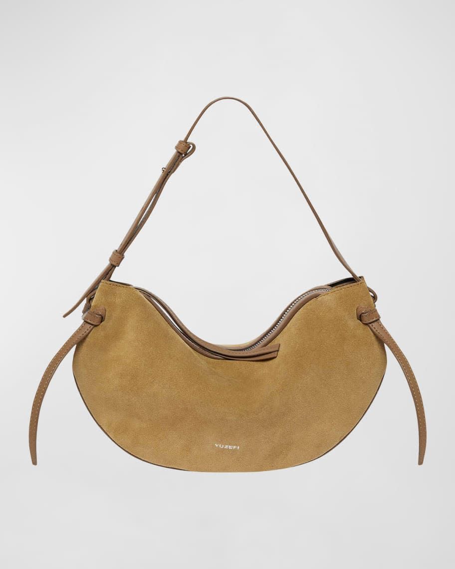 <p><a href="https://go.redirectingat.com?id=74968X1596630&url=https%3A%2F%2Fwww.neimanmarcus.com%2Fp%2Fyuzefi-fortune-cookie-suede-shoulder-bag-prod262270017&sref=https%3A%2F%2F" rel="nofollow noopener" target="_blank" data-ylk="slk:Shop Now;elm:context_link;itc:0;sec:content-canvas" class="link ">Shop Now</a></p><p>Yuzefi Fortune Cookie Suede Shoulder Bag</p><p>https://www.neimanmarcus.com</p><p>$560.00</p>