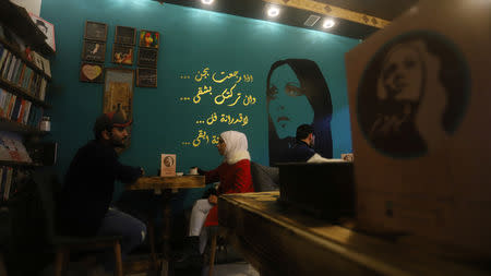 People have coffee at a cafe called Fayruz Cafe after the famous female Lebanese singer Fayruz, in Basra, Iraq December 27, 2018. Picture taken December 27, 2018. REUTERS/Essam al-Sudani