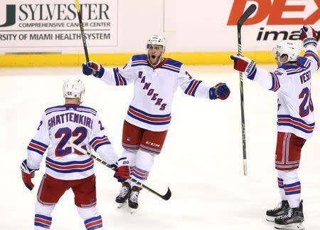 Dec 8, 2018; Sunrise, FL, USA; New York Rangers defenseman Fredrik Claesson (33) celebrates his goal against the Florida Panthers with defenseman Kevin Shattenkirk (22) and left wing Jimmy Vesey (26) in the third period at BB&T Center. Robert Mayer-USA TODAY Sports