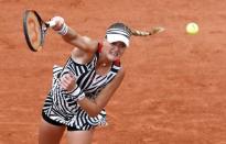 Tennis - French Open - Roland Garros - Serena Williams of the U.S v Kristina Mladenovic of France - Paris, France - 28/05/16. Mladenovic serves. REUTERS/Jacky Naegelen