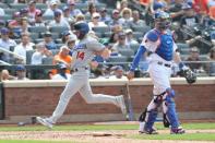 Jun 24, 2018; New York City, NY, USA; Los Angeles Dodgers center fielder Enrique Hernandez (14) heads home to score during the eighth inning against the New York Mets at Citi Field. Mandatory Credit: Anthony Gruppuso-USA TODAY Sports