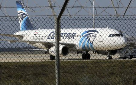 A hijacked Egypt Air A320 airbus stands on the runway at Larnaca Airport in Larnaca, Cyprus , March 29, 2016. REUTERS/Yiannis Kourtoglou