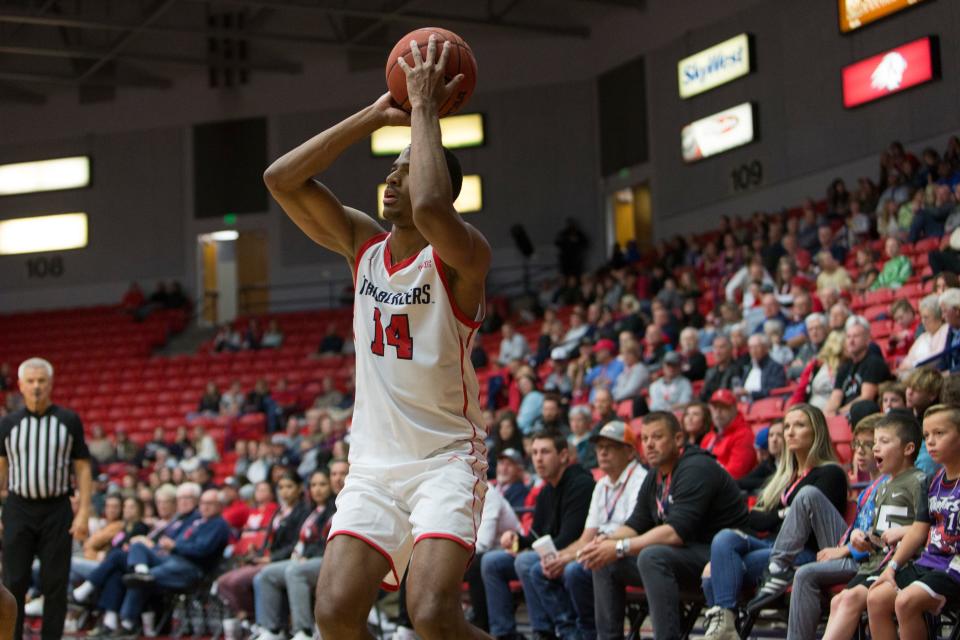 Dixie State's Dancell Leter takes a shot from the perimeter on his way to a career-high 17 points as the Trailblazers lose to Weber State 87-70 on Saturday, Nov. 27, 2021.