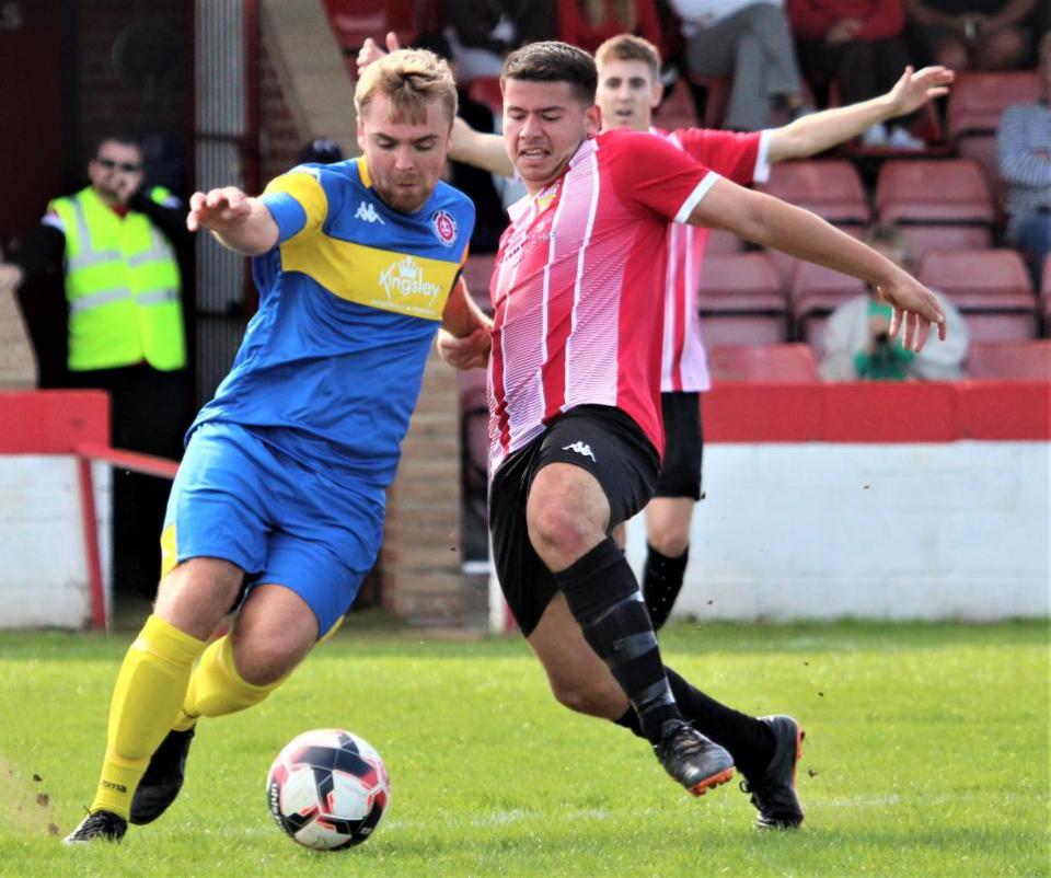 Isle of Wight County Press: Keelan Walsh in action for East Cowes Vics against Whitchurch United in the Wessex League. Photo: Graham Brown