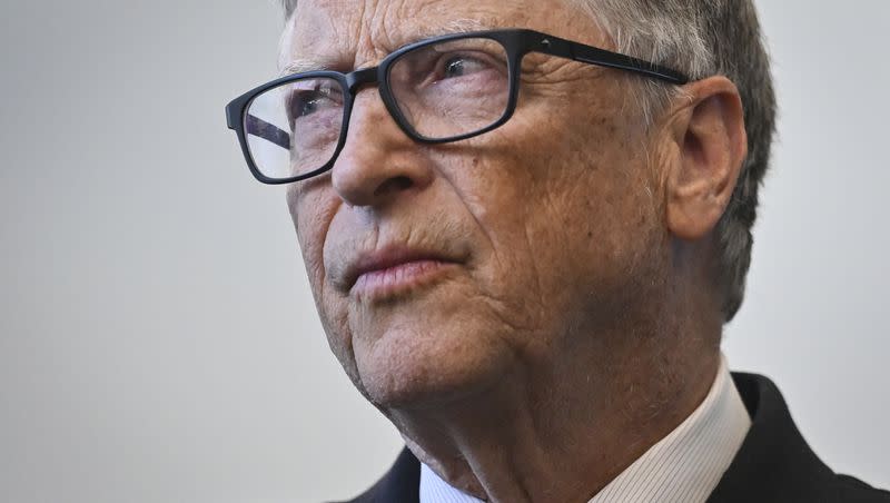 Bill Gates reacts during a visit with Britain’s Prime Minister Rishi Sunak at the Imperial College University, in central London, Wednesday Feb. 15, 2023.