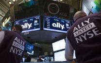 Traders work at the Post that trades Ally Financial Inc. following the IPO on the floor of the New York Stock Exchange April 10, 2014. REUTERS/Brendan McDermid