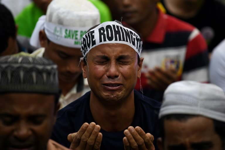 An ethnic Rohingya Muslim refugee breaks down during a gathering in Kuala Lumpur on December 4, 2016 against the persecution of Rohingya Muslims in Myanmar