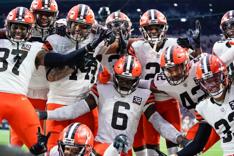 Cleveland Browns linebacker Jeremiah Owusu-Koramoah (6) celebrates with teammates after intercepting a pass during the first half of an NFL football game against the Houston Texans, Sunday, Dec. 24, 2023, in Houston. (AP Photo/Eric Christian Smith)