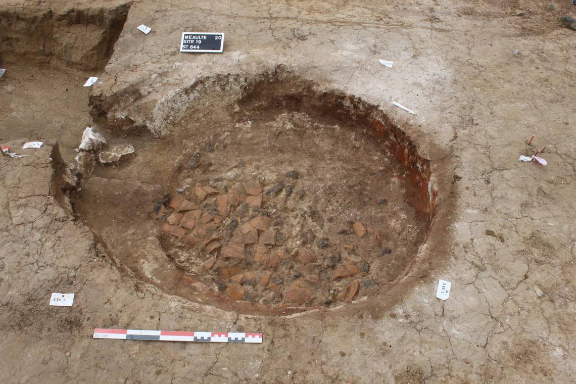 The remains of ancient ceramics were found in the pits, archaeologists said.