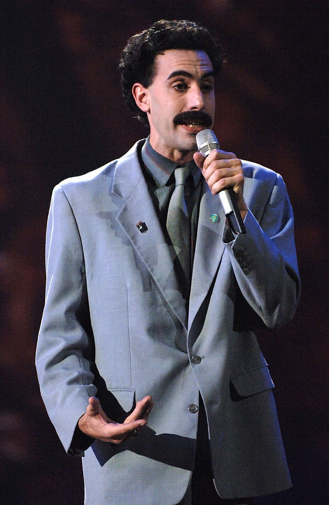 closeup of him talking into a mic while he hosts the show