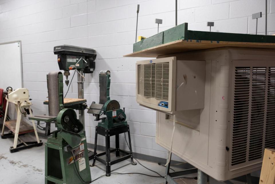 A swamp cooler is the only equipment to cool the shop room at Alpine Middle School.