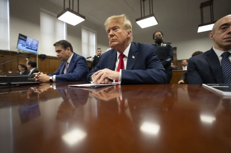 Former President Donald Trump sits in the courtroom at Manhattan Criminal Court in New York on Thursday. Michael Cohen, a one-time fixer and personal attorney to Trump, continued testifying in the hush-money criminal trial against the former president. Pool photo by Steven Hirsch/UPI