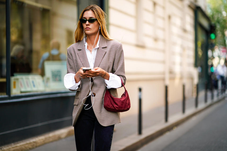 <p>Simplicity is forever chic. A white button-down and skinny jeans are crisp with a smaller check pattern. Bonus points for a complementary burgundy pop.</p> <h4>Getty Images</h4>