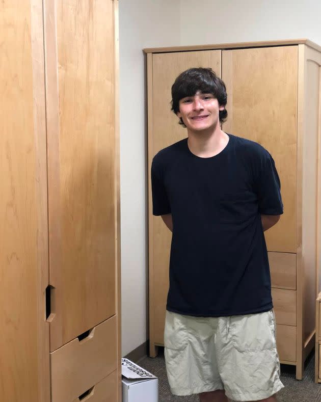 Henry in his dorm room during move-in.