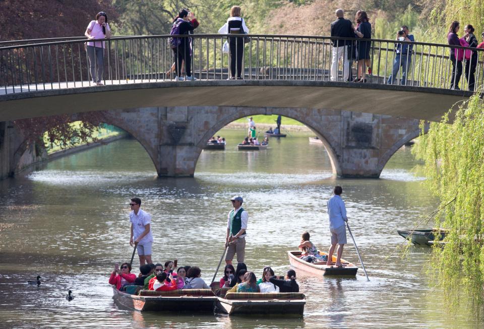 What a difference a week makes – punters in Cambridge last weekend (Rex)