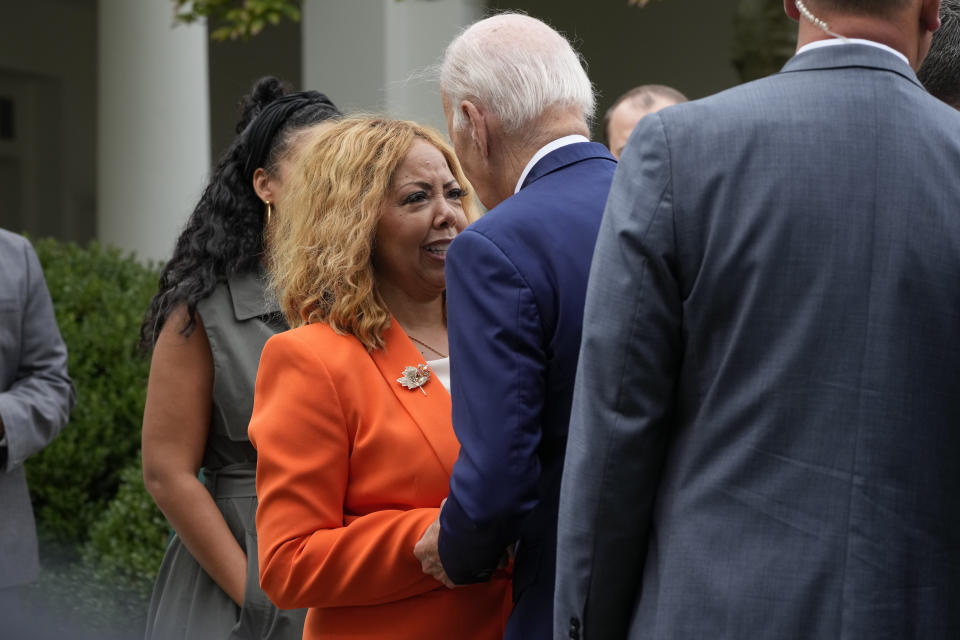 President Joe Biden talks with Rep. Lucy McBath, D-Ga., after he spoke about gun safety on Friday, Sept. 22, 2023, from the Rose Garden of the White House in Washington. (AP Photo/Jacquelyn Martin)