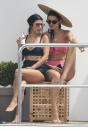 <p>Otherwise, it’s been all about rocking retro bikinis and being seen for the leggy reality star, pictured aboard a yacht with her big sis on May 23. Movies schmovies! (Photo: Backgrid) </p>