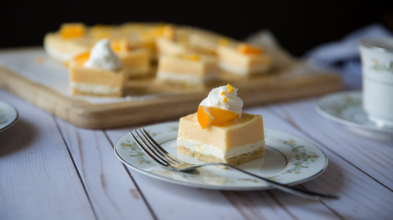 orange dessert bars on dish