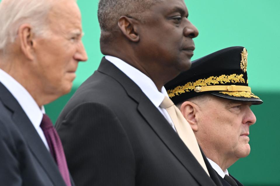 President Joe Biden, Defense Secretary Lloyd Austin and retiring Chairman, Army General Mark Milley attend the Armed Forces Farewell Tribute in honor of Milley, at Joint Base Myer-Henderson Hall in Arlington, Virginia, on September 29, 2023.