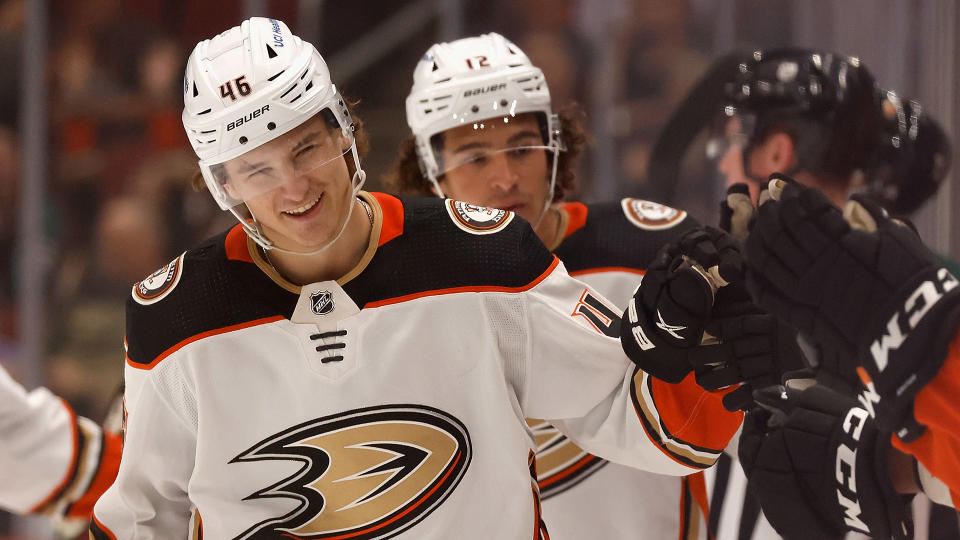 Trevor Zegras of the Anaheim Ducks celebrates with teammates on the bench after scoring a goal against the Arizona Coyotes. (Photo by Christian Petersen/Getty Images)