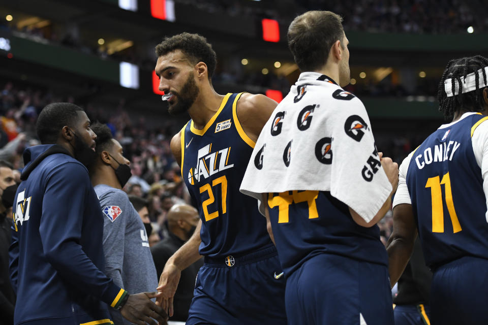 Rudy Gobert walks off court after getting ejected.