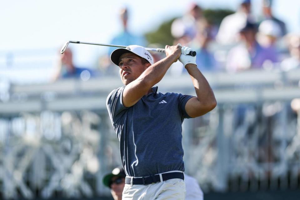 Xander Schauffele watches the ball as he hits from the seventeenth tee box on Thursday, May 4, 2023 during the first round of the Wells Fargo Championship at Quail Hollow Club.