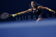 Shelby Rogers, of the United States, reaches to hit a return to Daria Kasatkina, of Russia, at the Mubadala Silicon Valley Classic tennis tournament in San Jose, Calif., Sunday, Aug. 7, 2022. (AP Photo/Godofredo A. Vásquez)