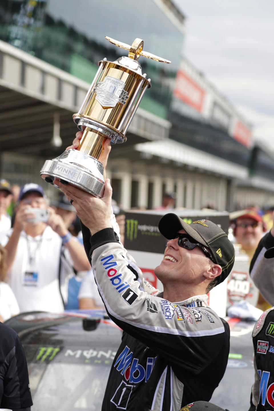 Kevin Harvick celebrates after winning the NASCAR Brickyard 400 auto race at Indianapolis Motor Speedway, Sunday, Sept. 8, 2019, in Indianapolis. (AP Photo/Michael Conroy)