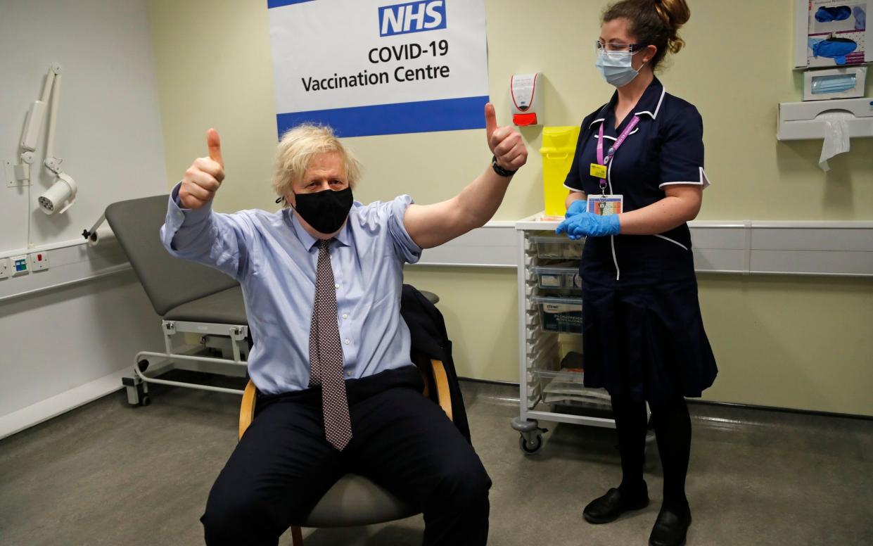 Boris Johnson receives the first dose of the AstraZeneca vaccine - Frank Augstein/AP POOL