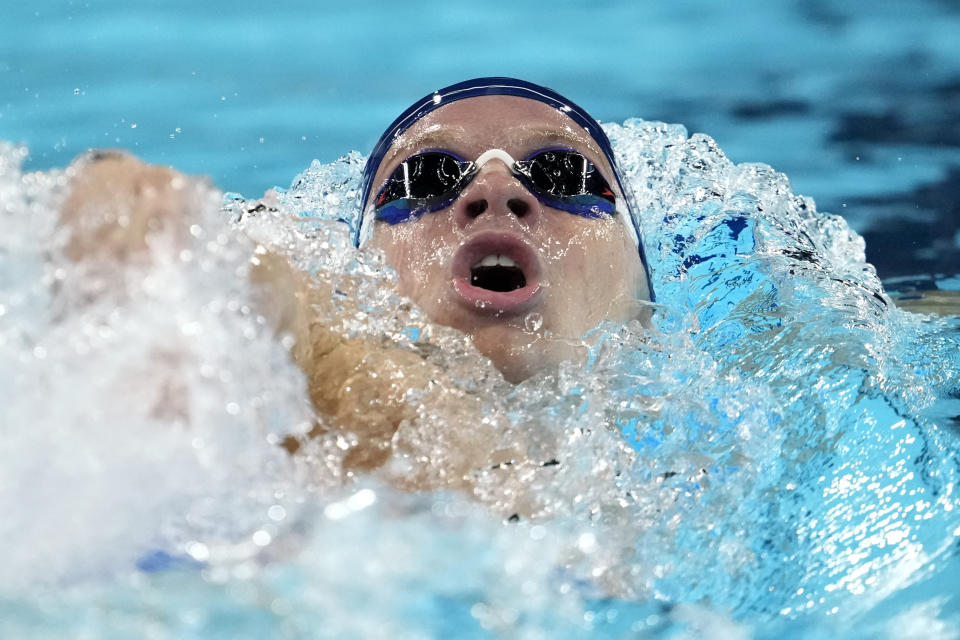 Leon Marchand, of France, competes during a heat in the men's 400-meter individual medley at the 2024 Summer Olympics, Sunday, July 28, 2024, in Nanterre, France. (AP Photo/Matthias Schrader)